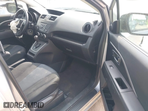 2014 Mazda 5 Sport with VIN JM1CW2BL6E0164195, listed as a IAAI auction lot 42455158 with 155,007 mi miles and . Bid and sale history available at DreamBid. Image 5.