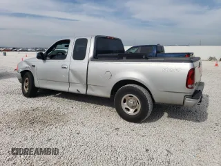 2002 Ford F-150 XL with VIN 1FTRX17282NA63790, listed as a Copart auction lot 42057394 with 158,054 mi miles and Salvage Title. Bid and sale history available at carsss.com. Image 2.