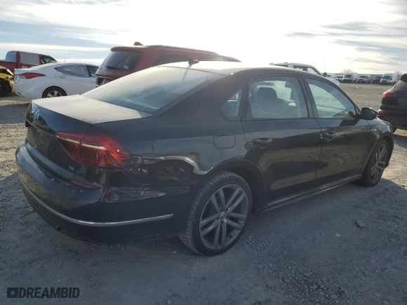 2018 Volkswagen Passat 2.0T S with VIN 1VWAA7A31JC002534, listed as a Copart auction lot 85221344 with 100,934 mi miles and Salvage Title. Bid and sale history available at carsss.com. Image 3.