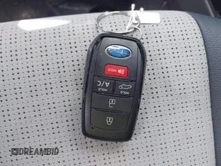 2024 Subaru Solterra Premium z VIN JTMABABA6RA053657, wystawiony jako IAAI lot #42451075 z przebiegiem 13 805 mil mil oraz . Historia ofert i sprzedaży dostępna na DreamBid. Obrazek 11.