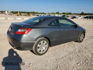 2010 Honda Civic Cpe LX with VIN 2HGFG1B67AH527237, listed as a Copart auction lot 71032914 with 184,842 mi miles and Salvage Title. Bid and sale history available at carsss.com. Image 3.