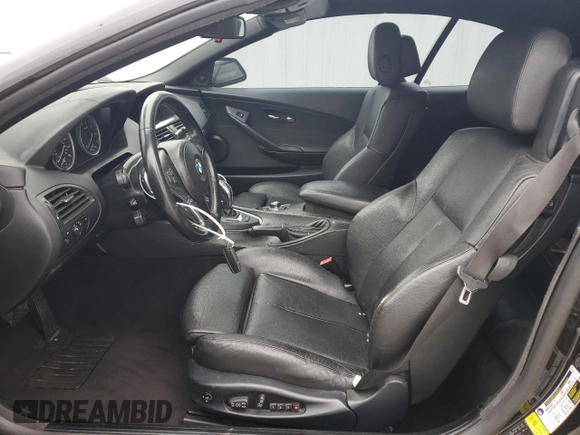 2010 BMW 6 Series 650i z VIN WBAEB5C57AC224979, wystawiony jako Copart lot #80849124 z przebiegiem 157 782 mil mil oraz Czysty tytuł • Clean title. Historia ofert i sprzedaży dostępna na DreamBid. Obrazek 7.