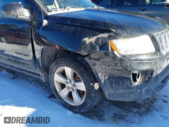 2012 Jeep Compass Sport with VIN 1C4NJDBB5CD685098, listed as a IAAI auction lot 41456429 with 157,334 mi miles. Bid and sale history available at carsss.com. Image 6.