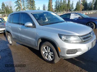 2014 Volkswagen Tiguan SE z VIN WVGBV3AX6EW528570, wystawiony jako IAAI lot #41871551 z przebiegiem 105 186 mil mil oraz . Historia ofert i sprzedaży dostępna na DreamBid. Obrazek 1.