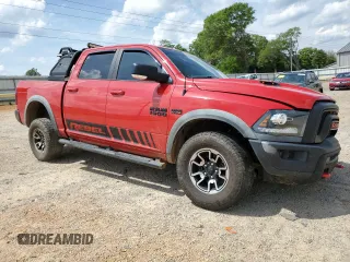 2016 Ram 1500 Rebel z VIN 1C6RR7YT8GS251598, wystawiony jako Copart lot #55291555 z przebiegiem 128 756 mil mil oraz Szkoda całkowita • Salvage title. Historia ofert i sprzedaży dostępna na DreamBid. Obrazek 4.