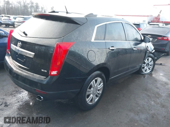 2013 Cadillac SRX Luxury Collection with VIN 3GYFNGE37DS629724, listed as a IAAI auction lot 41485910 with 151,977 mi miles. Bid and sale history available at carsss.com. Image 4.