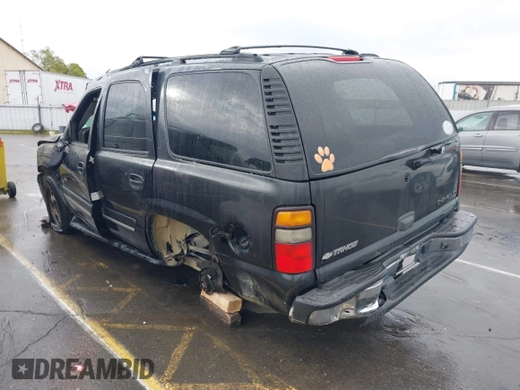 2005 Chevrolet Tahoe Z71 with VIN 1GNEC13T15R205653, listed as a IAAI auction lot 41808672 with 210,261 mi miles and . Bid and sale history available at DreamBid. Image 3.