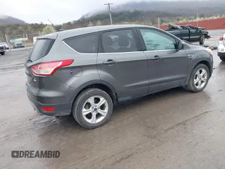 2015 Ford Escape SE with VIN 1FMCU9GX6FUC73272, listed as a IAAI auction lot 41966307 with 118,144 mi miles and . Bid and sale history available at DreamBid. Image 4.