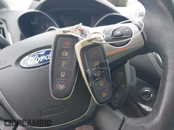 2014 Ford Escape Titanium with VIN 1FMCU0JX2EUA28679, listed as a IAAI auction lot 41930585 with 164,038 mi miles. Bid and sale history available at carsss.com. Image 11.