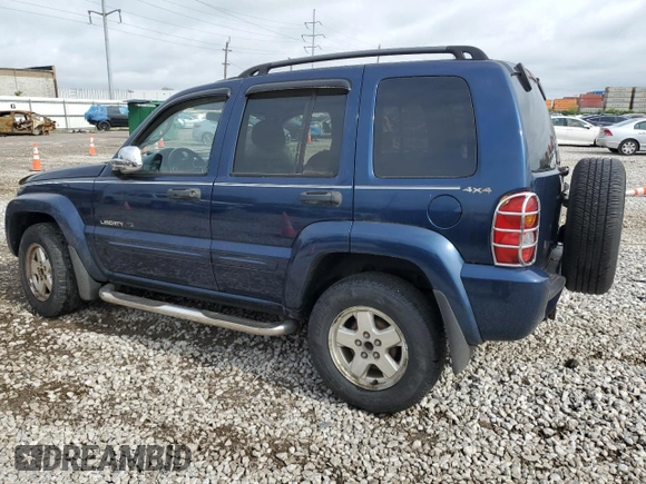 2002 Jeep Liberty Limited with VIN 1J4GL58K52W213948, listed as a Copart auction lot 60555885 with 96,415 mi miles and Salvage title. Bid and sale history available at DreamBid. Image 2.