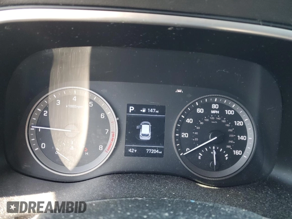 2019 Hyundai Tucson Value with VIN KM8J33A43KU888877, listed as a Copart auction lot 52191305 with 77,204 mi miles and Salvage title. Bid and sale history available at DreamBid. Image 9.