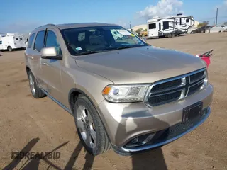 2014 Dodge Durango Limited z VIN 1C4RDHDG8EC970556, wystawiony jako IAAI lot #41126325 z przebiegiem 114 223 mil mil oraz . Historia ofert i sprzedaży dostępna na DreamBid. Obrazek 1.