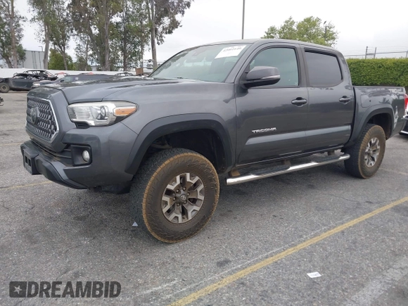 2018 Toyota Tacoma SR5 with VIN 3TMAZ5CN1JM071396, listed as a IAAI auction lot 42061640 with 122,148 mi miles and . Bid and sale history available at DreamBid. Image 2.