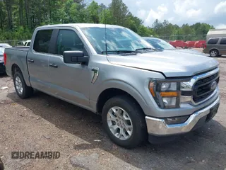 2023 Ford F-150 XL with VIN 1FTEW1C84PKD69454, listed as a IAAI auction lot 42087856 with 53,164 mi miles. Bid and sale history available at carsss.com. Image 1.