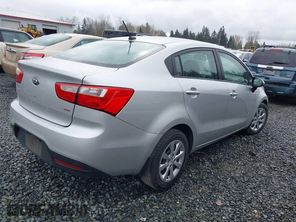 2014 Kia Rio LX with VIN KNADM4A31E6327403, listed as a IAAI auction lot 41915952 with 127,167 mi miles. Bid and sale history available at carsss.com. Image 4.