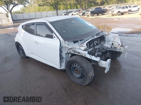2017 Hyundai Veloster with VIN KMHTC6AD2HU312538, listed as a IAAI auction lot 42128452 with 1 mi miles. Bid and sale history available at carsss.com. Image 1.
