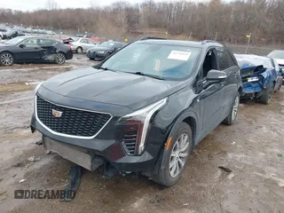2021 Cadillac XT4 AWD Sport with VIN 1GYFZFR49MF065225, listed as a IAAI auction lot 41191994 with 58,095 mi miles and . Bid and sale history available at DreamBid. Image 17.