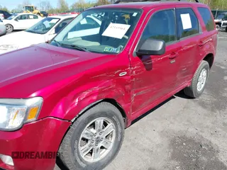 2008 Mercury Mariner with VIN 4M2CU91138KJ47288, listed as a IAAI auction lot 42149561 with 158,460 mi miles and . Bid and sale history available at DreamBid. Image 6.