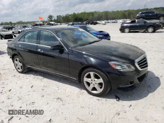 2015 Mercedes-Benz E 350 Luxury with VIN WDDHF8JB2FB127447, listed as a Copart auction lot 51243795 with 59,848 mi miles and Salvage Title. Bid and sale history available at DreamBid. Image 4.