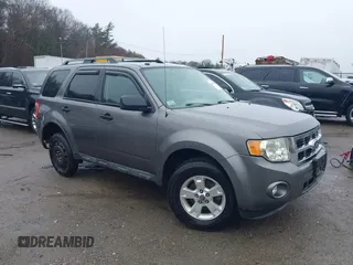 2010 Ford Escape XLT with VIN 1FMCU9D74AKB00651, listed as a IAAI auction lot 41800008 with 97,138 mi miles. Bid and sale history available at carsss.com. Image 1.