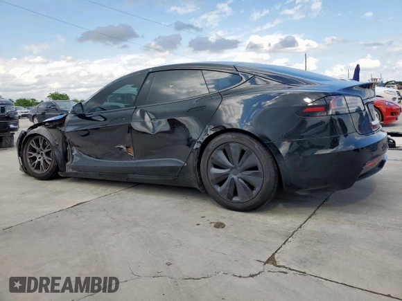 2022 Tesla Model S с VIN 5YJSA1E50NF492117, выставлен на аукционе Copart как лот 54307855 с пробегом 42 940 миль миль и Списание • Salvage title. История ставок и продаж доступна на DreamBid. Изображение 2.
