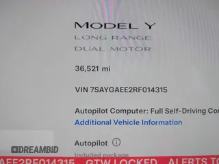 2024 Tesla Model Y Long Range with VIN 7SAYGAEE2RF014315, listed as a IAAI auction lot 42053183 with 36,521 mi miles and . Bid and sale history available at carsss.com. Image 15.