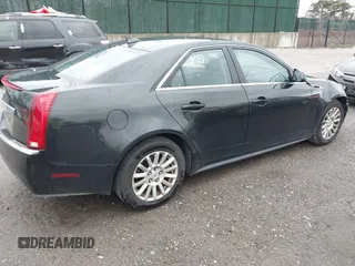 2011 Cadillac CTS z VIN 1G6DC5EY3B0107442, wystawiony jako IAAI lot #41918364 z przebiegiem 255 238 mil mil oraz . Historia ofert i sprzedaży dostępna na DreamBid. Obrazek 4.