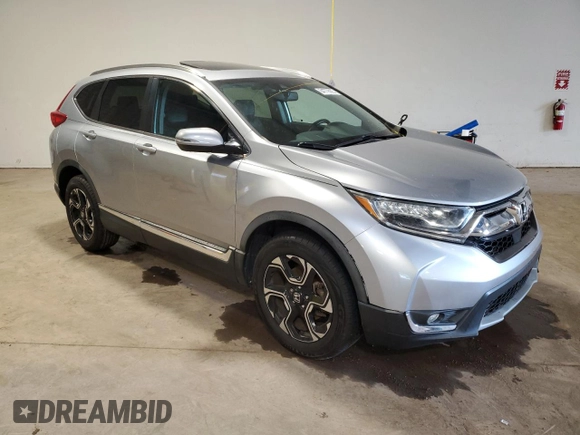 2018 Honda CR-V Touring z VIN 7FARW2H95JE012947, wystawiony jako Copart lot #64779925 z przebiegiem 20 561 mil mil oraz Szkoda całkowita • Salvage title. Historia ofert i sprzedaży dostępna na DreamBid. Obrazek 4.