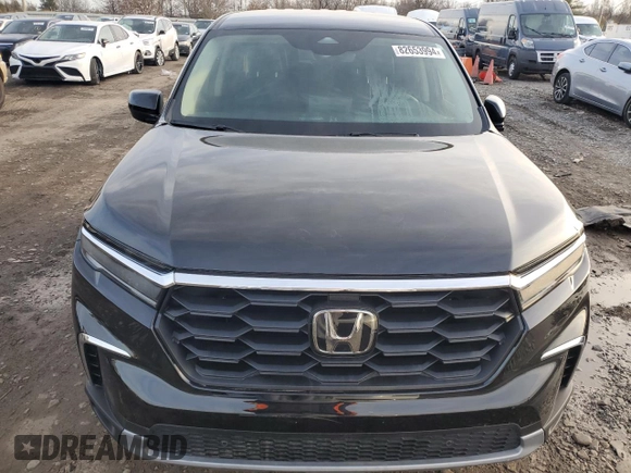 2024 Honda Pilot EX-L 7 Passenger with VIN 5FNYG1H51RB019899, listed as a Copart auction lot 82653994 with 7,399 mi miles and Salvage Title. Bid and sale history available at carsss.com. Image 5.