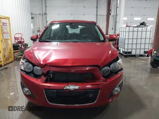 2013 Chevrolet Sonic LT with VIN 1G1JC6SH1D4116946, listed as a IAAI auction lot 41562425 with 116,815 mi miles. Bid and sale history available at carsss.com. Image 12.