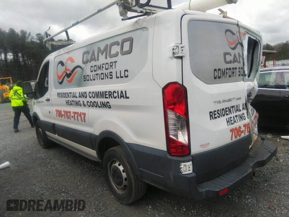 2016 Ford Transit Cargo with VIN 1FTYR1ZM7GKA14464, listed as a IAAI auction lot 41230405 with 120,604 mi miles and . Bid and sale history available at DreamBid. Image 3.