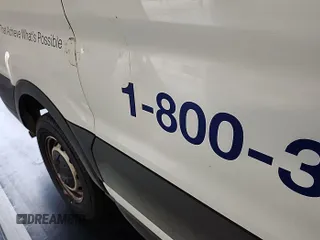 2020 Ford Transit Cargo with VIN 1FTBR1Y89LKA55098, listed as a IAAI auction lot 41946176 with 119,258 mi miles and . Bid and sale history available at DreamBid. Image 1.