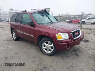 2004 GMC Envoy SLE with VIN 1GKDT13S742294622, listed as a IAAI auction lot 41562352 with 1 mi miles. Bid and sale history available at carsss.com. Image 1.