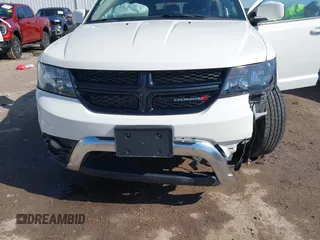 2018 Dodge Journey Crossroad z VIN 3C4PDDGG0JT386534, wystawiony jako IAAI lot #41958650 z przebiegiem 128 938 mil mil oraz . Historia ofert i sprzedaży dostępna na DreamBid. Obrazek 6.