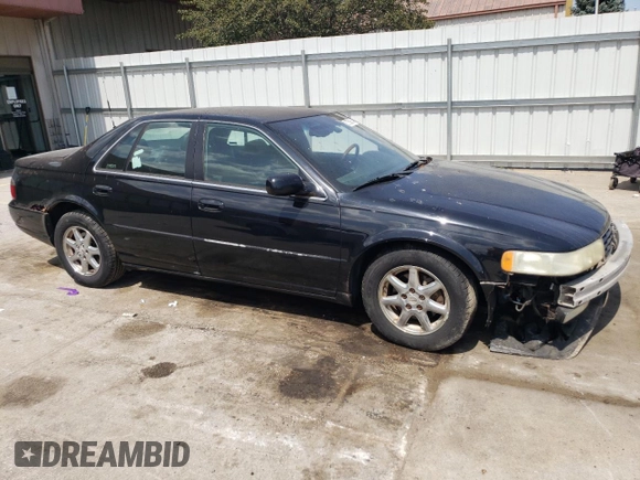 2001 Cadillac Seville Touring STS z VIN 1G6KY54961U257426, wystawiony jako Copart lot #45269275 z przebiegiem 177 990 mil mil oraz Nie do naprawy • Non repairable. Historia ofert i sprzedaży dostępna na DreamBid. Obrazek 4.