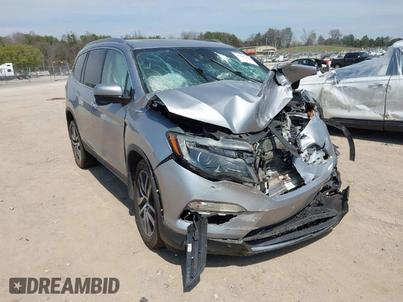 2017 Honda Pilot Touring with VIN 5FNYF6H98HB100335, listed as a IAAI auction lot 41907709 with 1 mi miles. Bid and sale history available at carsss.com. Image 1.