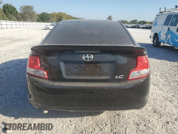 2012 Scion tC z VIN JTKJF5C73C3034583, wystawiony jako Copart lot #74317714 z przebiegiem 163 158 mil mil oraz Czysty tytuł • Clean title. Historia ofert i sprzedaży dostępna na DreamBid. Obrazek 6.