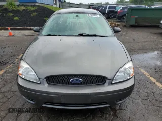 2004 Ford Taurus SES with VIN 1FAFP55S34A202771, listed as a Copart auction lot 61389605 with 180,144 mi miles and Clean title. Bid and sale history available at DreamBid. Image 5.
