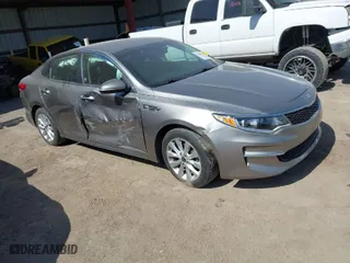 2018 Kia Optima S with VIN 5XXGT4L31JG267408, listed as a IAAI auction lot 41780014 with 111,940 mi miles. Bid and sale history available at carsss.com. Image 1.