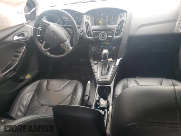 2017 Ford Focus Titanium with VIN 1FADP3N27HL251297, listed as a Copart auction lot 67373094 with 104,733 mi miles and Salvage Title. Bid and sale history available at carsss.com. Image 8.