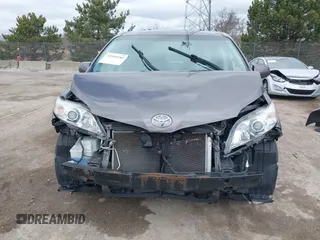 2014 Toyota Sienna XLE with VIN 5TDYK3DC0ES422700, listed as a IAAI auction lot 42049181 with 147,498 mi miles. Bid and sale history available at carsss.com. Image 12.