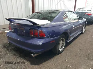 1998 Ford Mustang with VIN 1FAFP404XWF175772, listed as a IAAI auction lot 42686695 with 125,920 mi miles and . Bid and sale history available at DreamBid. Image 4.