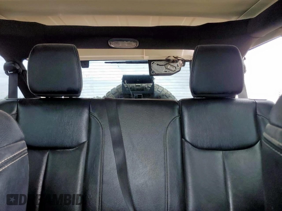 2015 Jeep Wrangler Unlimited Rubicon Hard Rock with VIN 1C4HJWFG1FL710264, listed as a Copart auction lot 54123285 with 96,737 mi miles and Salvage title. Bid and sale history available at DreamBid. Image 10.