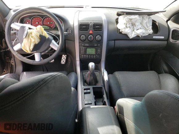 2004 Pontiac GTO with VIN 6G2VX12G24L261448, listed as a Copart auction lot 44951945 with 43,257 mi miles and Salvage Title. Bid and sale history available at DreamBid. Image 8.