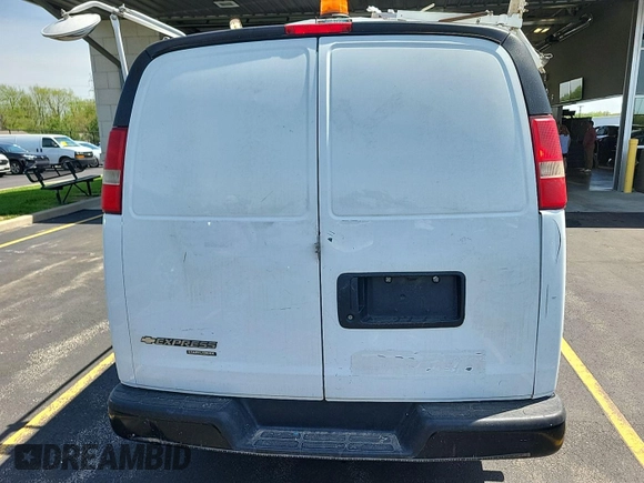 2012 Chevrolet Express Cargo Van with VIN 1GCWGFCA0C1178728, listed as a IAAI auction lot 42132184 with 148,560 mi miles. Bid and sale history available at carsss.com. Image 1.