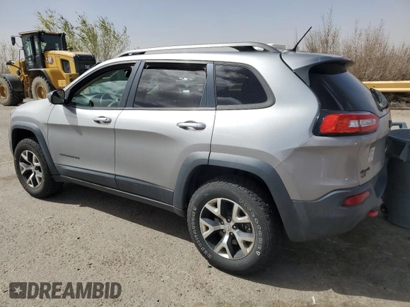 2015 Jeep Cherokee Trailhawk with VIN 1C4PJMBS3FW787033, listed as a Copart auction lot 49176735 with 83,013 mi miles and Salvage Title. Bid and sale history available at carsss.com. Image 2.