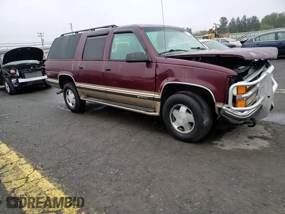 1999 Chevrolet Suburban with VIN 1GNFK16R7XJ402741, listed as a Copart auction lot 73283404 with 143,943 mi miles and Salvage Title. Bid and sale history available at carsss.com. Image 12.