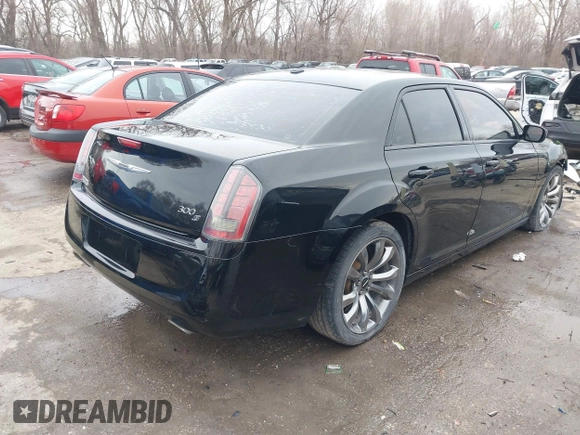 2014 Chrysler 300 S with VIN 2C3CCABG9EH373159, listed as a IAAI auction lot 41707636 with 218,045 mi miles and . Bid and sale history available at DreamBid. Image 4.