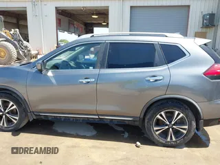 2017 Nissan Rogue SL with VIN JN8AT2MT2HW407004, listed as a IAAI auction lot 41884121 with 79,227 mi miles and . Bid and sale history available at DreamBid. Image 14.