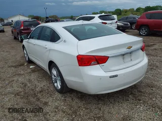 2015 Chevrolet Impala LT with VIN 1G1125S30FU140935, listed as a IAAI auction lot 42153988 with 147,828 mi miles and . Bid and sale history available at DreamBid. Image 3.